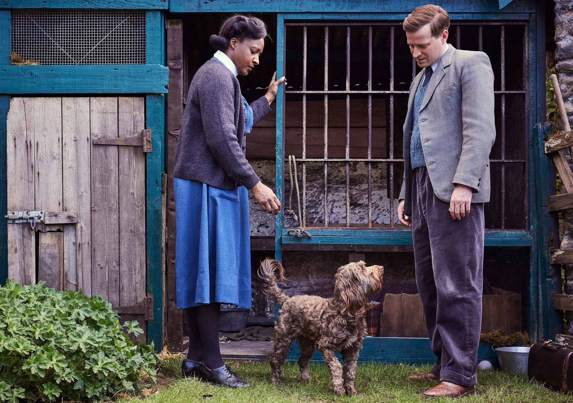 Sister Rose (Elexi Walker), James Herriot (Nicholas Ralph), with Jeffrey the dog. 