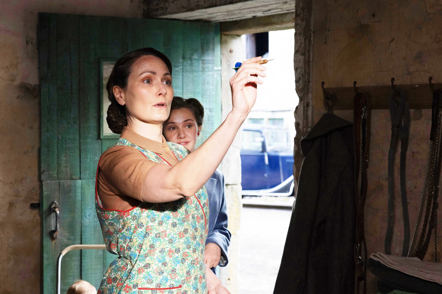 Audrey Hall (Anna Madeley) impresses Maggie (Mollie Winnard) in the kitchen at Skeldale House.