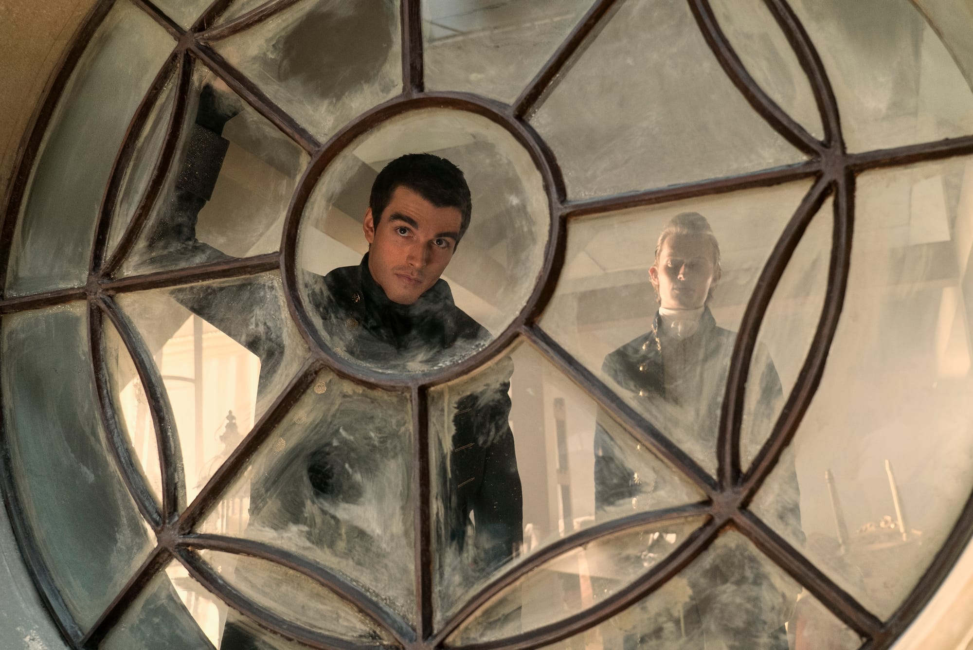 Corey Mylchreest as Young King George, Freddie Dennis as Reynolds in Queen Charlotte: A Bridgerton Story.&nbsp;