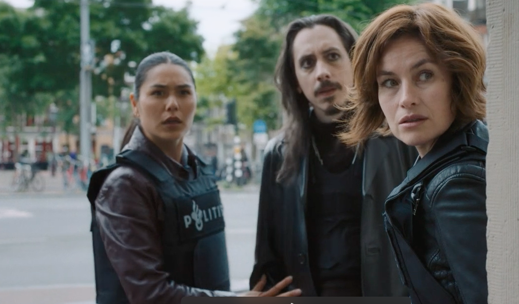 Herman Zaal's (Rasmus Hardiker) big day out gets a bit too exciting as&nbsp;Citra Li (Django Chan-Reeves) and Lucienne Hassell (Mamie McCoy) get him away from potential gunfire.