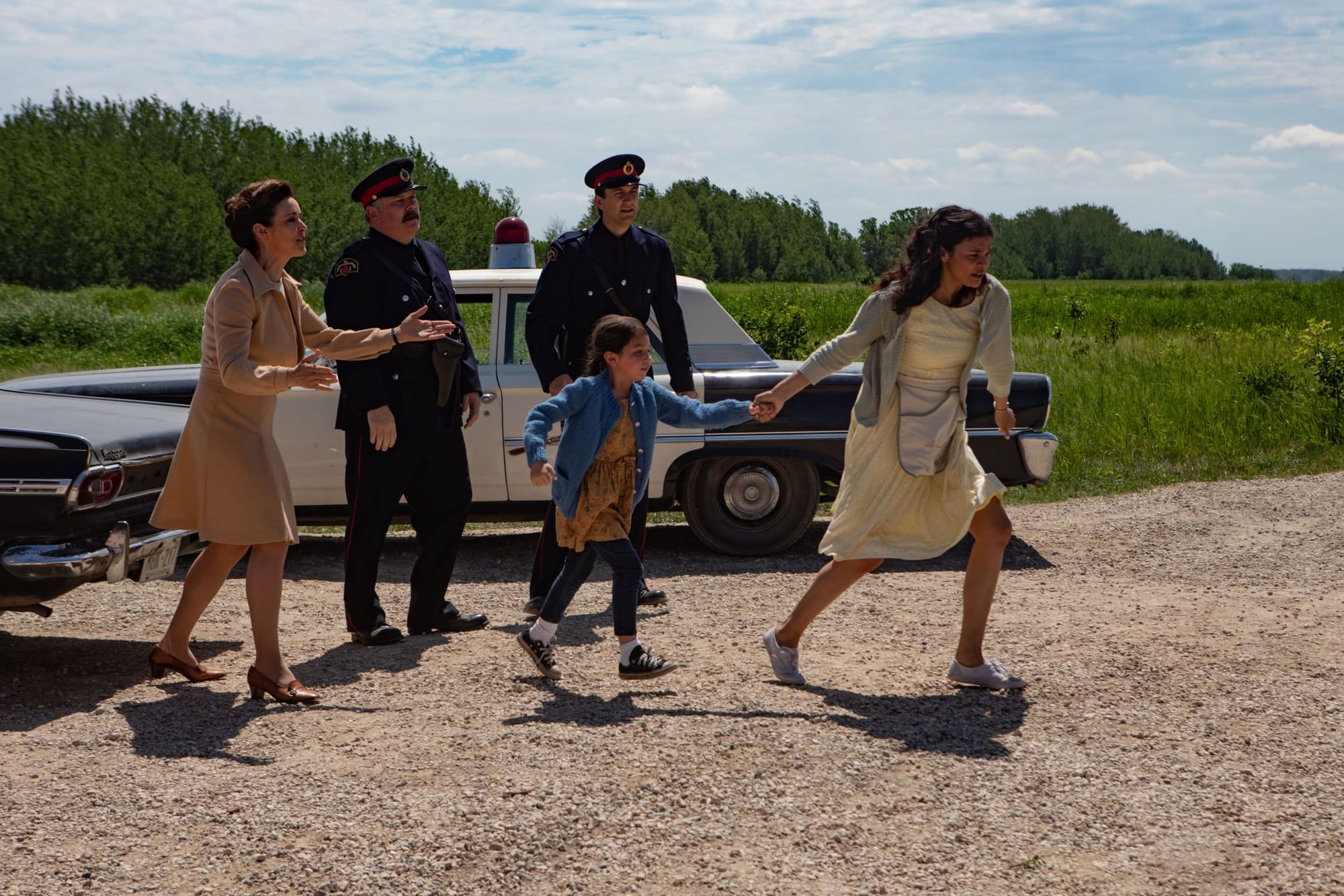 Janet Kidder as Jeannie, Darren Ross and Kristian Jordan as Police Officers,&nbsp;Keris Hope Hill as&nbsp;Young Bezhig and&nbsp;Ellyn Jade as Patti in 'Little Bird'