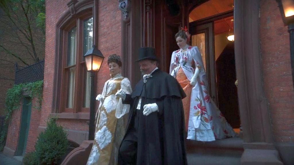 Donna Murphy as Mrs. Astor, Nathan Lane as Ward McAllister, and Amy Forsyth as Carrie Astor in The Gilded Age Season 2 finale 