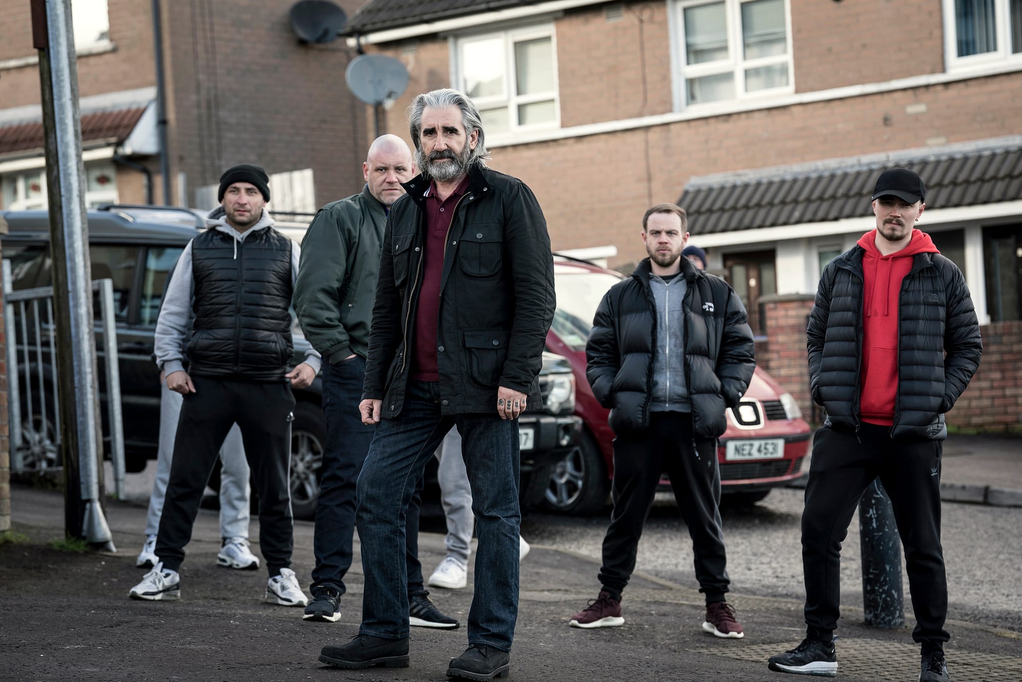 Gerard Jordan as Anto Donovan, John Lynch as James McIntyre, and Michael Shea as Mo McIntyre in 'Blue Lights' Season 1