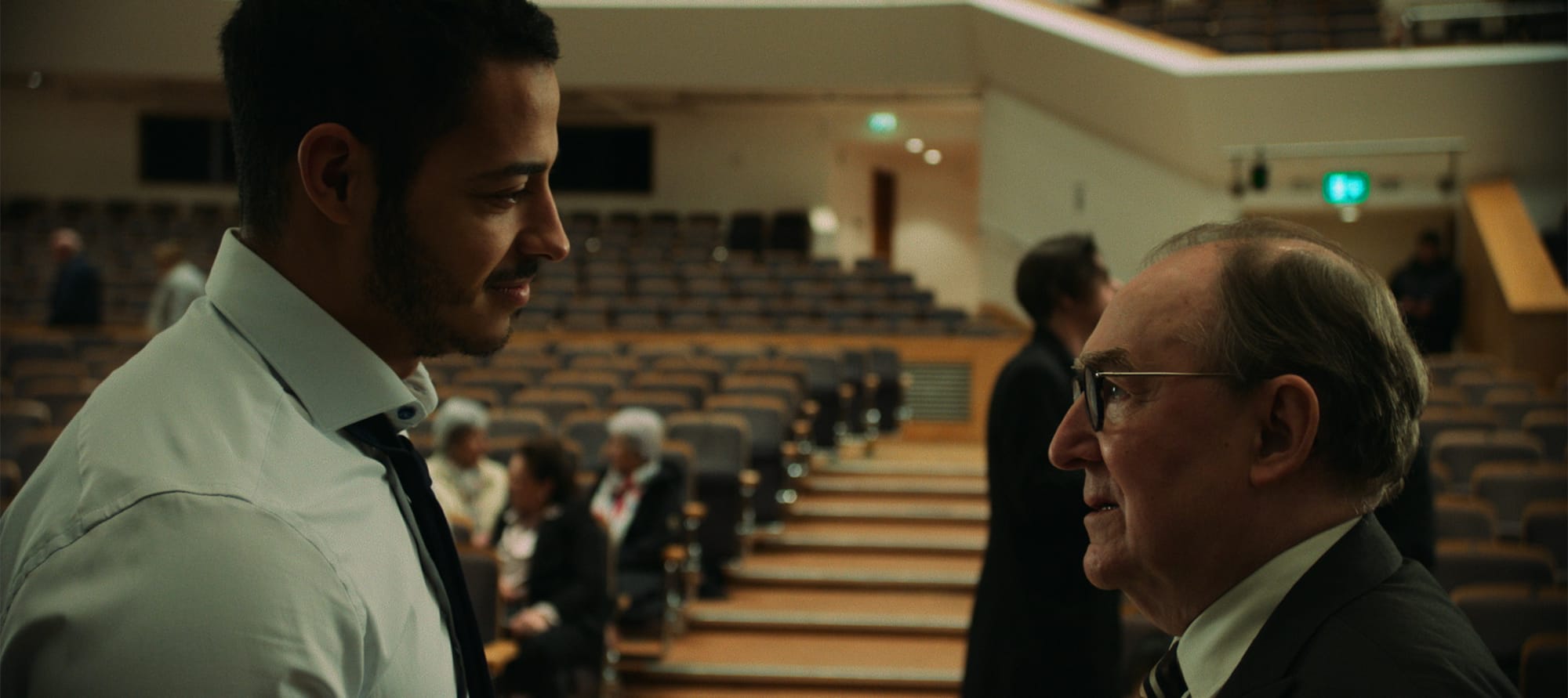 Daryl McCormack as Colman and Dermot Crowley as Coyle in The Woman in the Wall