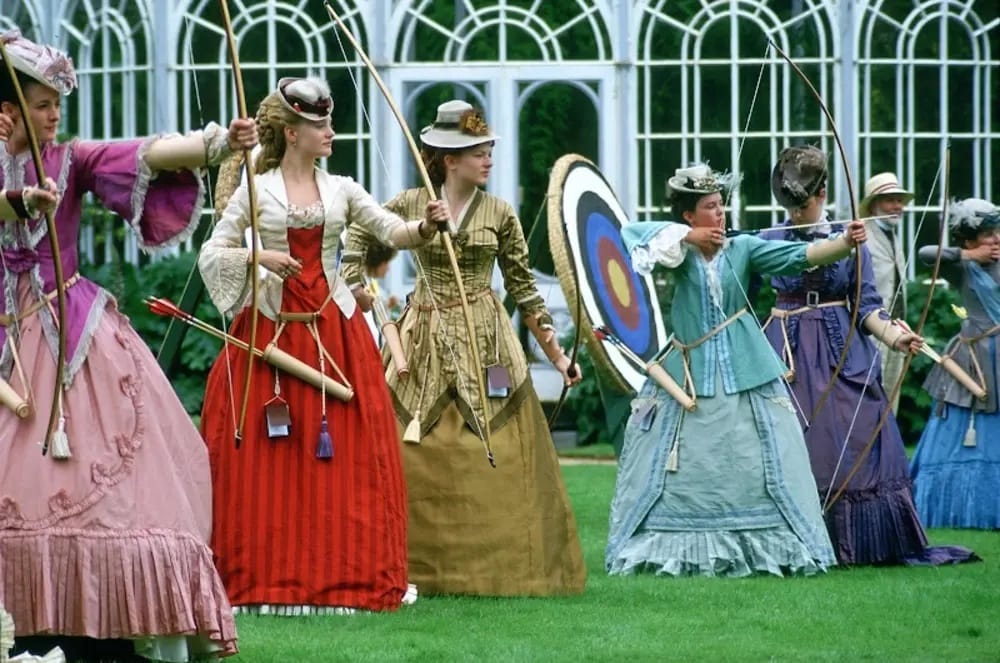Romola Garai (Gwendolen) and Catherine Arrowpoint (Anna Steel) take part in an archery contest.