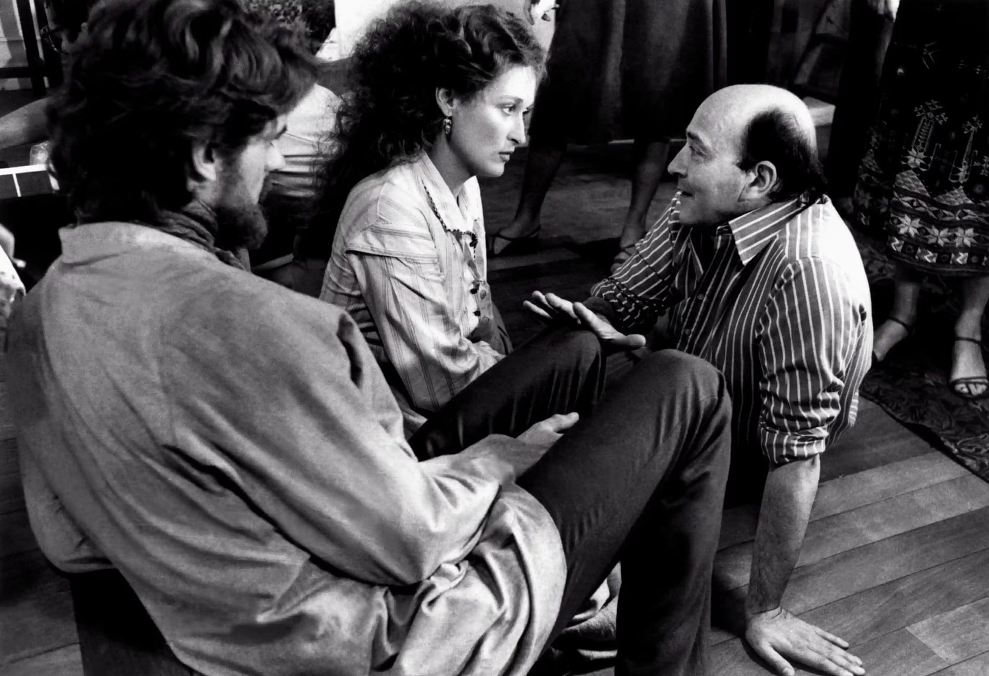 Jeremy Irons, Director Karel Reisz, and Meryl Streep on set in the Lake Windermere scene.