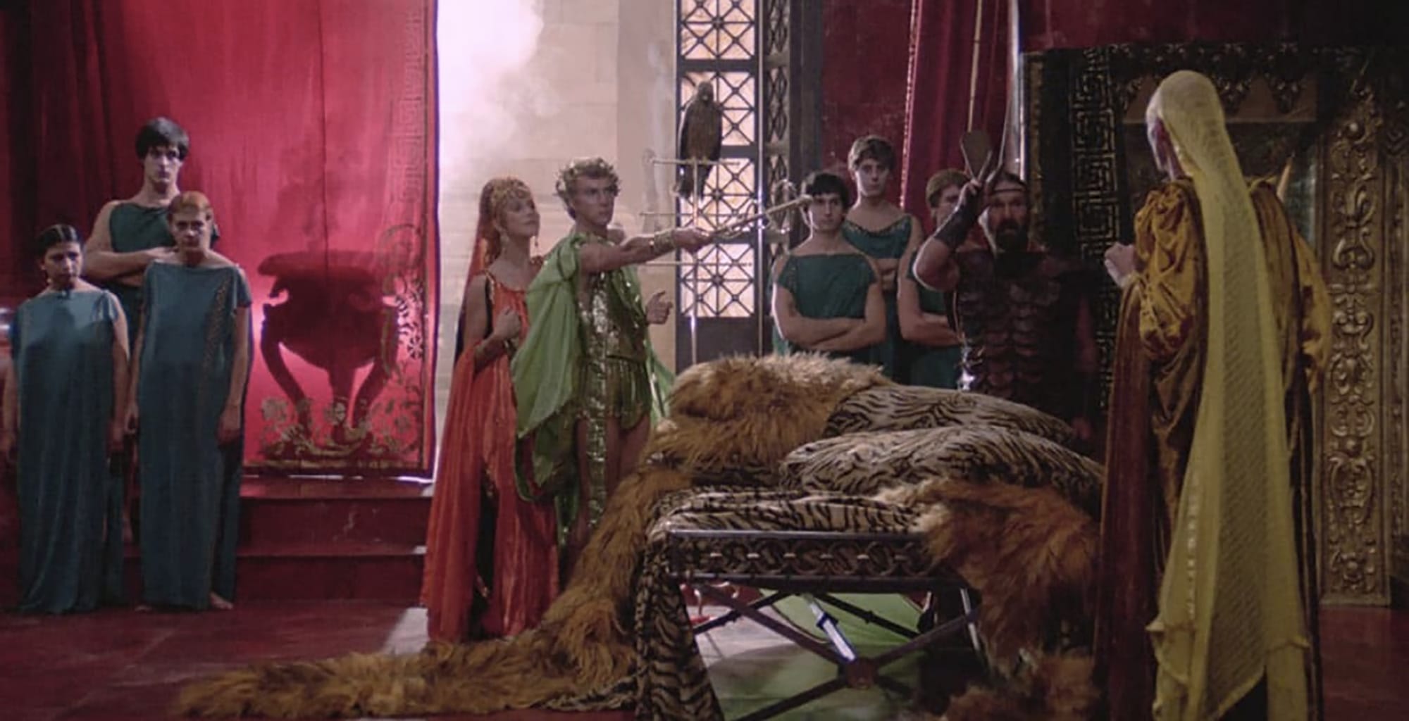 Helen Mirren as Caesonia, Malcolm McDowell as Caligula, and Teresa Ann Savoy as Drusilla in 'Caligula: The Ultimate Cut'