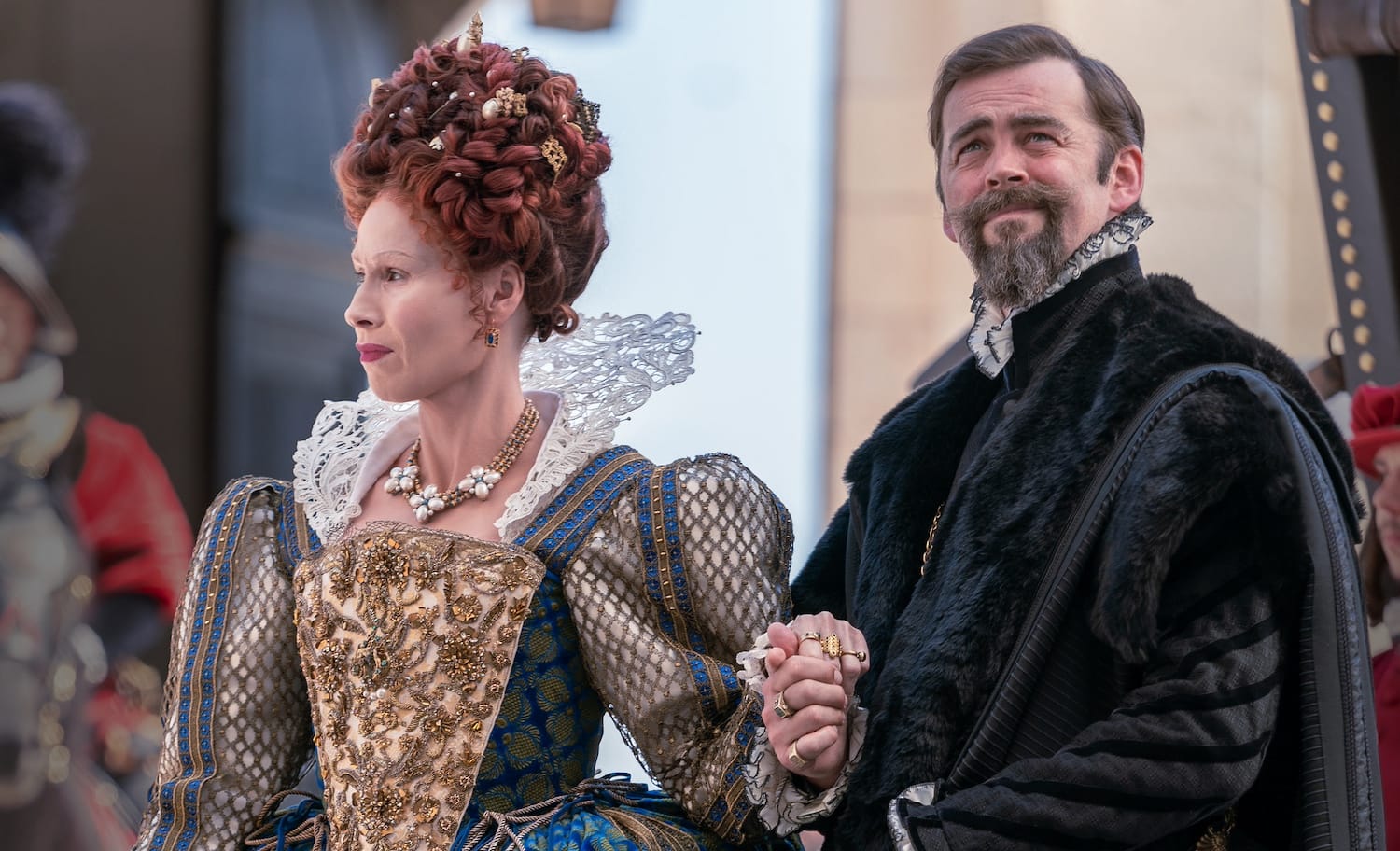 Queen Elizabeth I of England (Minne Driver) with her advisor Throckmorton (Alex Price) about to wow the Valois.