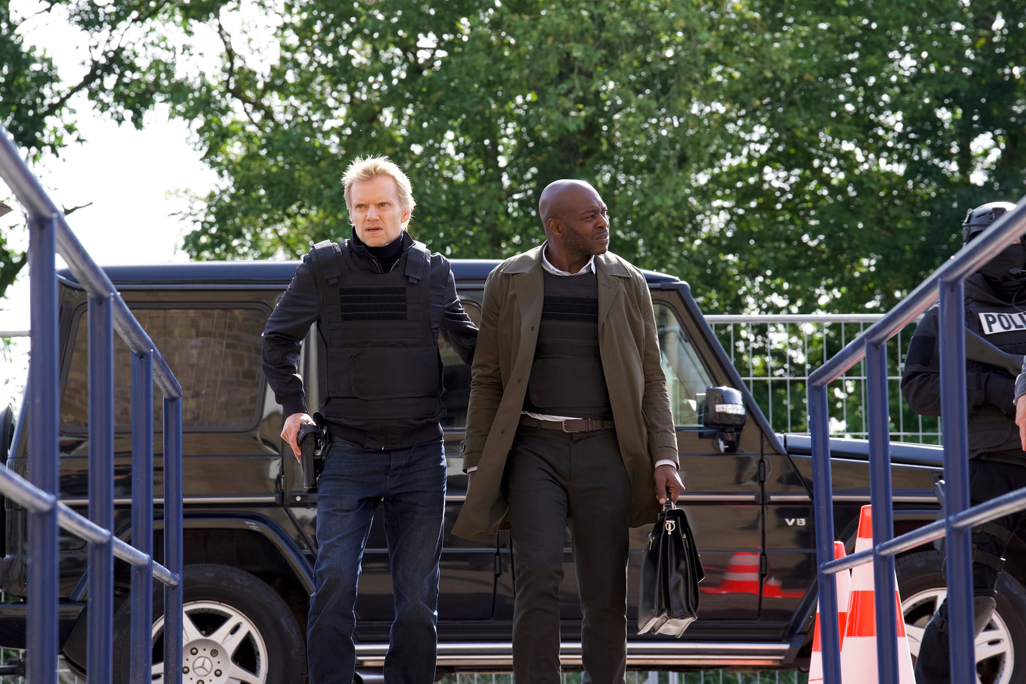 Marc Warren as Piet Van der Valk and Mandela Wee Wee as Anton de Haas in 'Van der Valk' Season 4