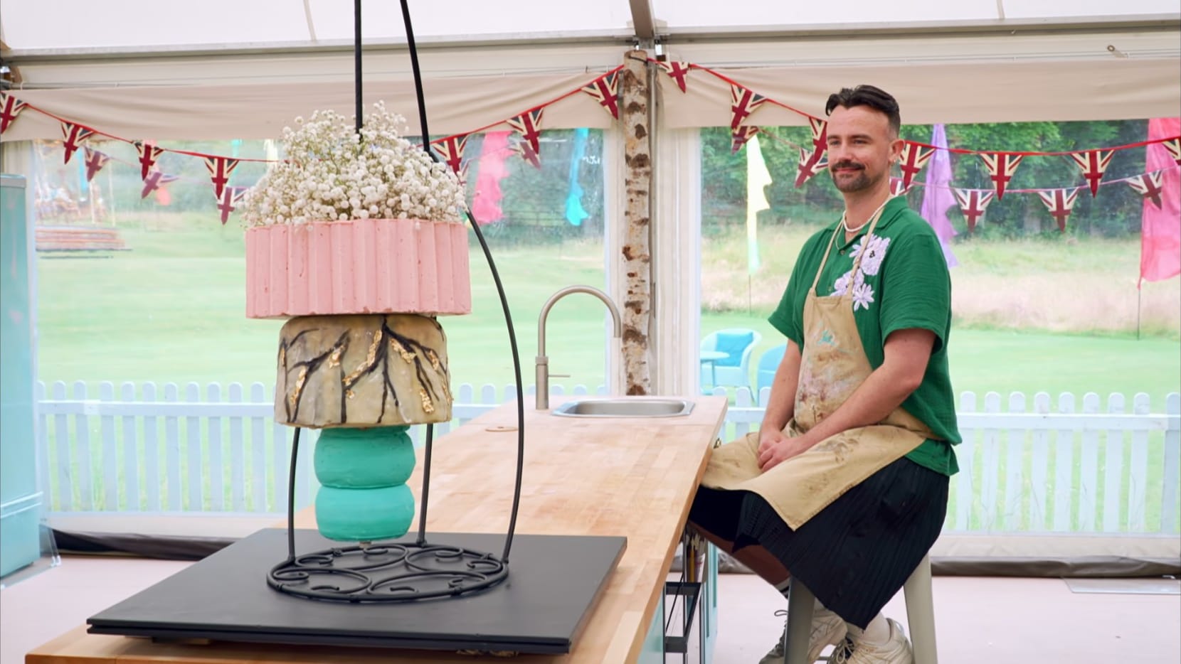 Christiaan with his ‘Sculpted Summer’ Showstopper from 'The Great British Baking Show's Season 15 Finale
