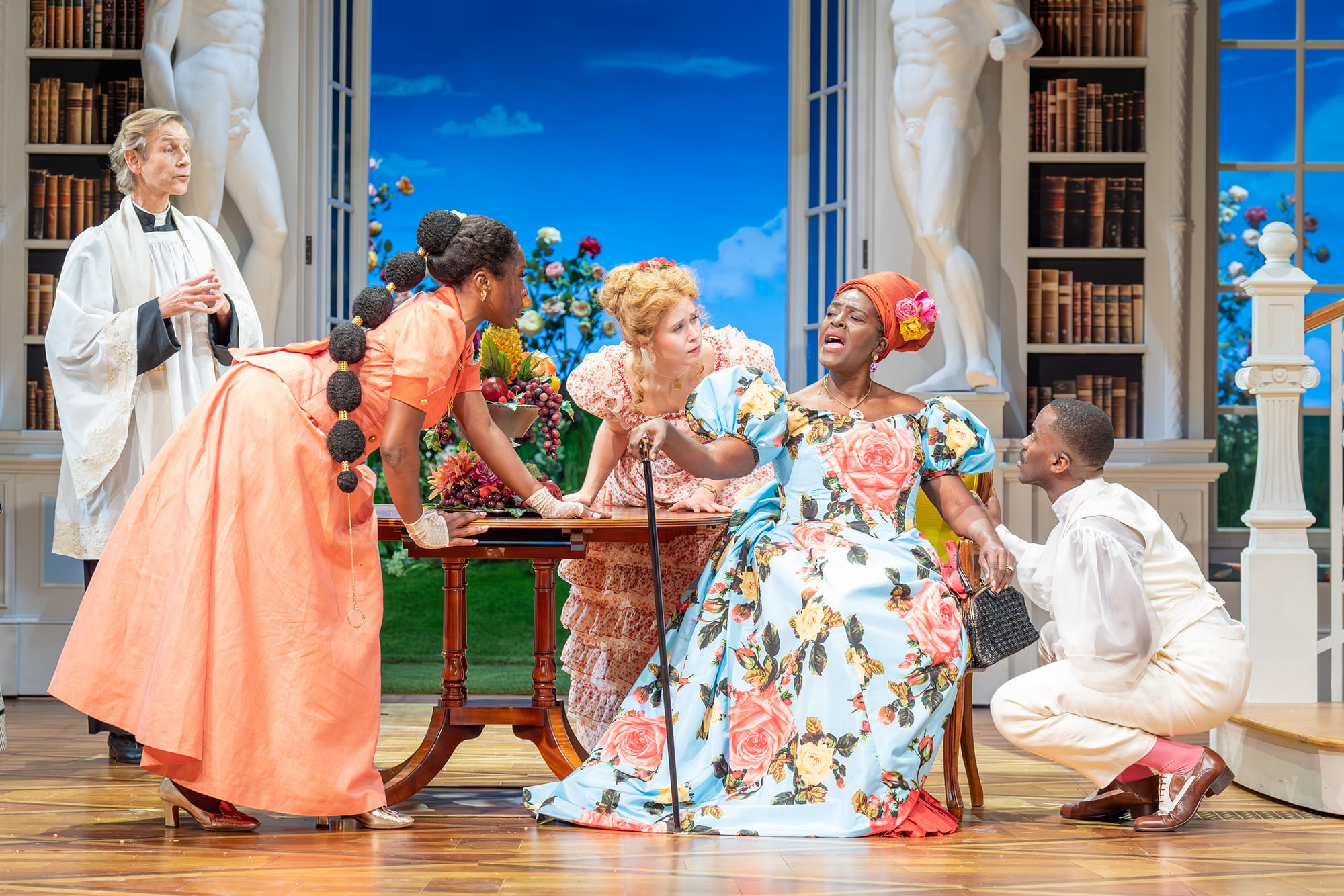 Richard Cant as Reverend Chasuble, Ronke Adekoluejo as Gwendolen, Eliza Scanlen as Cecily, Sharon D Clarke as Lady Bracknell, and Ncuti Gatwa as Algernon in 'The Importance of Being Earnest'