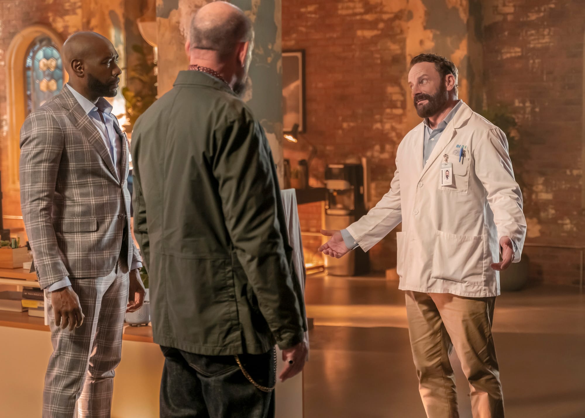 Morris Chestnut as Dr. John Watson, Ritchie Coster as Shinwell Johnson, and Ryan Robbins as Lloyd the Pharmacist in 'Watson' Season 1