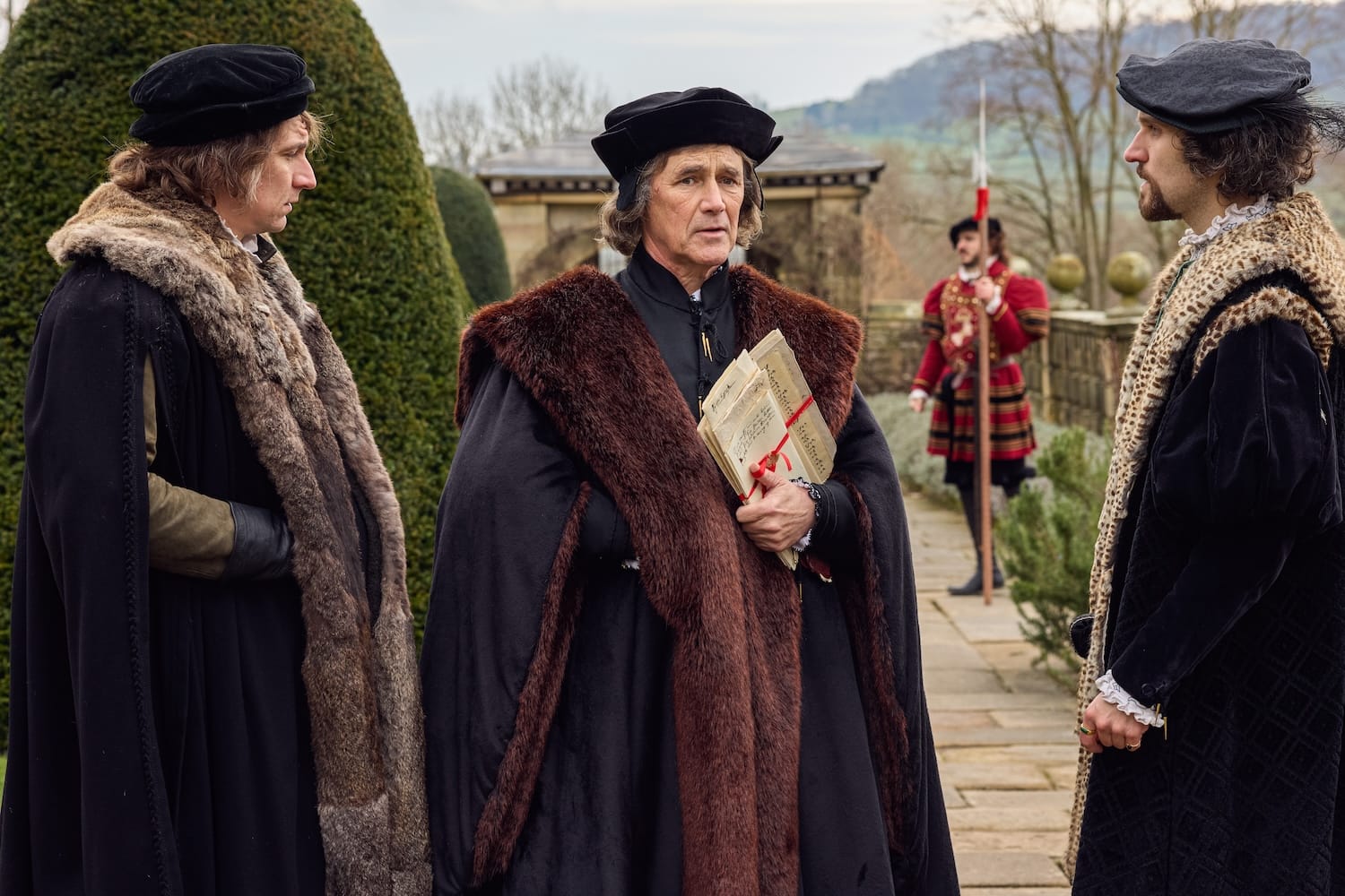 Mark Rylance, Tom Mothersdale, and Harry Melling in "Wolf Hall: The Mirror and the Light"