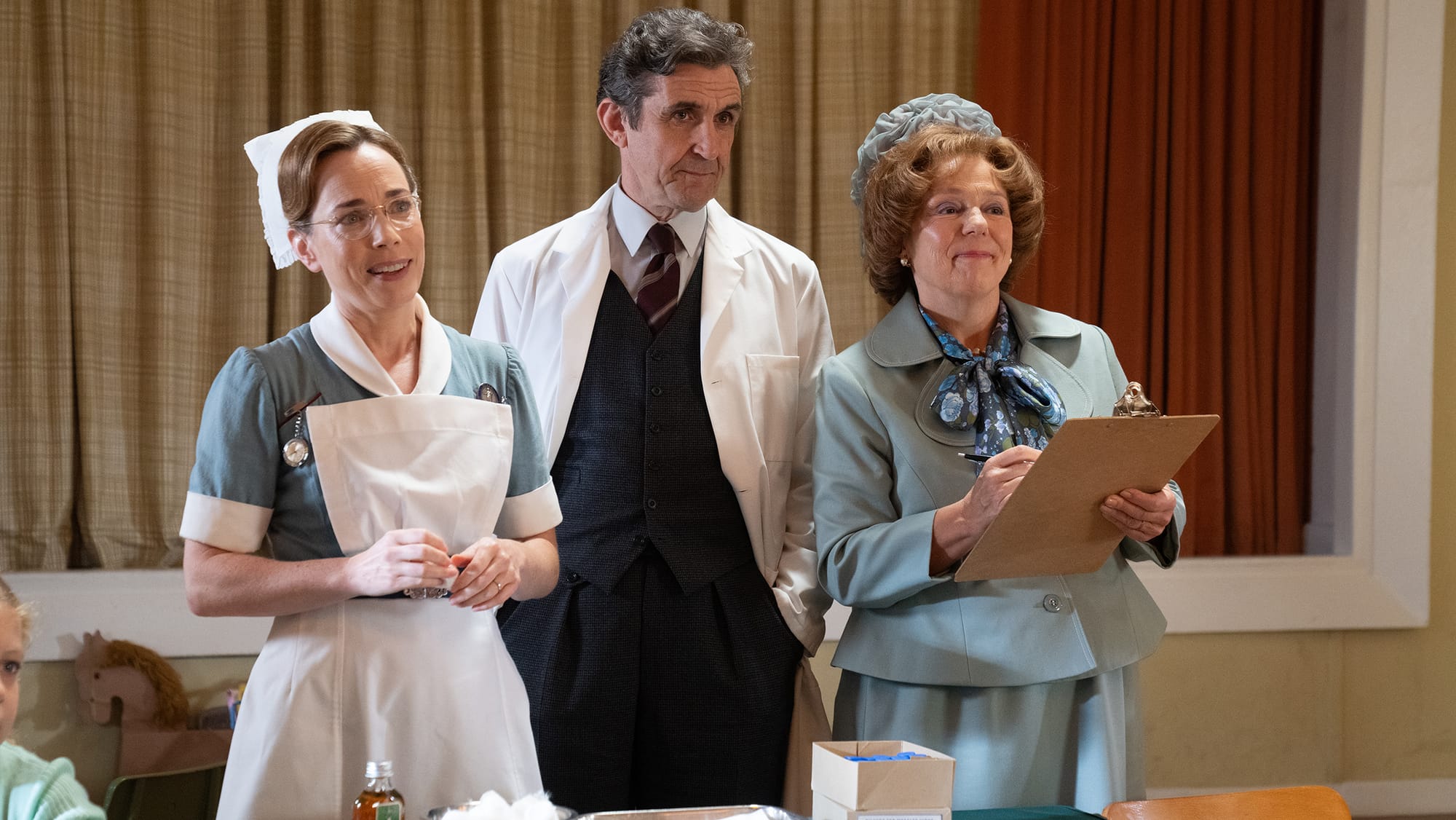 Laura Main as Shelagh Turner, Stephen McGann as Dr. Turner, and Annabelle Apsion as Mayor Violet Buckle in 'Call the Midwife' Season 14