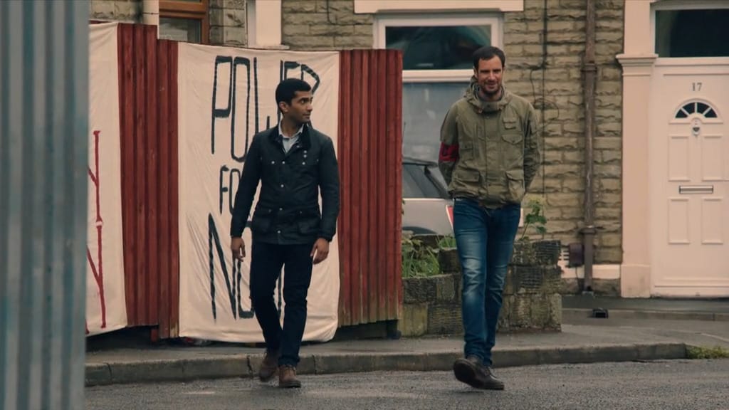 Danny Ashok as Manish Patel and Charlie Carrick as Scott Minett in COBRA Season 1